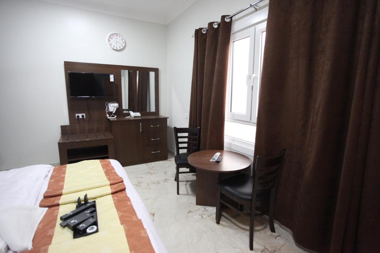 Almanzel Hotel Apartments Маскат Экстерьер фото